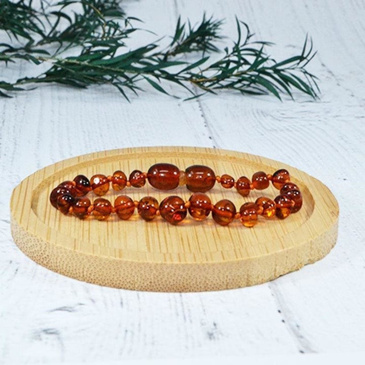 Babyarmband aus Bernstein, lindert Zahnschmerzen und beruhigt - COGNAC - 14cm - Irréversible Bijoux
