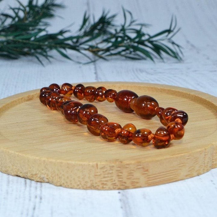 Babyarmband aus Bernstein, lindert Zahnschmerzen und beruhigt - COGNAC - 14cm - Irréversible Bijoux