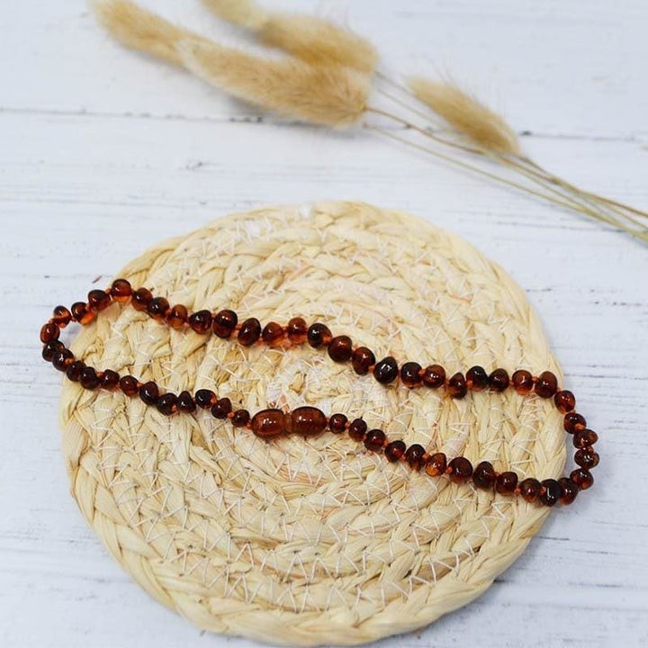 Collier bébé en Ambre, soulage les maux de dents et apaise - COGNAC - 32cm - Irréversible Bijoux