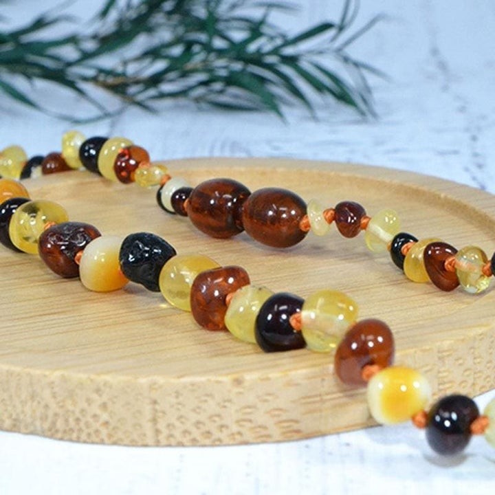 Collier bébé en Ambre, soulage les maux de dents et apaise - MULTI - 32cm - Irréversible Bijoux